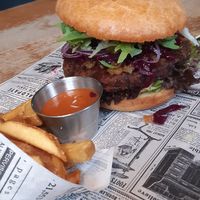 Vegan burger, chips and jamaican dip at Addicted to Rock in Vienna