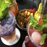 Vegan Burger and drinks (blue: soda galaxy, back: exotic love, right: redhope)  at To80 vegan in Cologne