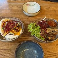 Small bowls: Mango bao bun and spring rolls. Would recommend both   at To80 vegan in Cologne