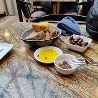 Appetizers included in the menu. Olive oil is delicious. at Jardineiro - Vegan Kitchen in Porto