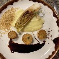 Mushroom scallops with truffled mashed potatoes and endive with fig oil  at Jardineiro - Vegan Kitchen in Porto