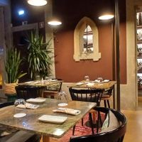 This dining room was after what looked like a library/living room. The whole place was lovely. One of the staff was crafting handmade decorations for Christmas. at Jardineiro - Vegan Kitchen in Porto