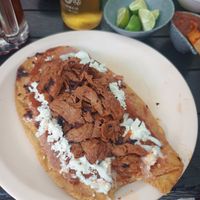 Huarache de mixiotes at Vegangos in Mexico City