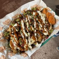 Sus nachos griegos 🙌🏻  at Tacones Lejanos - Cloud Kitchen in Mexico City