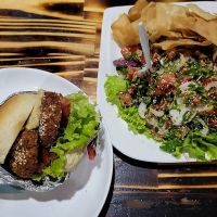 Falafel burger and tabule salad at El Palacio Del Falafel in Montevideo