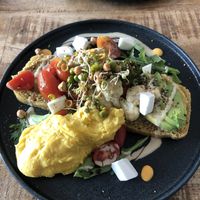 Focaccia with cauliflower, other veg, vegan scramble   at Alua Catering Cafe in Dresden