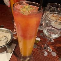 I was too busy eating to take pictures but this passion fruit mocktail was lovely! They have cocktails too! 🍹  at 4500 Miles From Delhi in Bristol