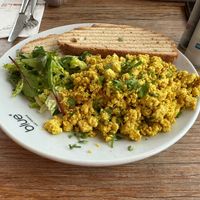 Vegan scrambled tofu with toast   at Blue  in Amsterdam