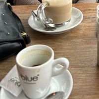 Chai latte (oat milk) and coffee with speculoos liqueur   at Blue  in Amsterdam