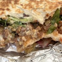 Vegan chicken and falafel wrap   at Nomad Cafe and Deli in Harrogate