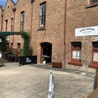 Exterior with outdoor seating  at Glee Coffee Roasters in Wyong