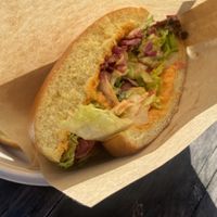Miso mushroom burger cut into two for sharing  at Ibiza bowls in Copenhagen