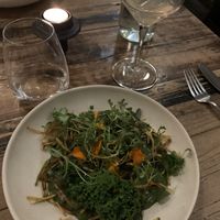 Main dish. Green mushroom risotto with crispy potato sticks  at Høst in Copenhagen