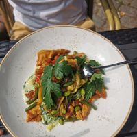 Pasta with vegetables, tzaziki and seitan. at Festland in Krummhoern