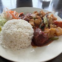 #30 Chon 1-3 mon- (Choice of 3 entrees)- Teriyaki vegan soy drumstick (shown in front), spicy vegan soy ribs, and sauteed vegetables at Veggie Garden in Orlando
