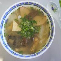 Pho ~ vietnamese noodle soup with rice noodles in vegetable broth with thinly sliced tofu, vegetables, soybean sprouts, lime and basil leaves (vegan) at Veggie Garden in Orlando