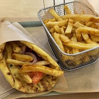 (vegan) Chicken souvlaki (€4) with French fries (€4).  at Mama Tierra - Acropolis in Athens