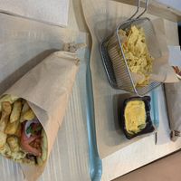 Chicken souvlaki and nachos with vegan cheese saucee  at Mama Tierra - Acropolis in Athens