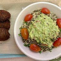 Lentil quinoa bowl with guacamole and side of falafels   at Mama Tierra - Acropolis in Athens