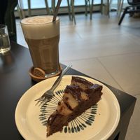 Chocolate pear cake and oat latte. #Veganuary at LUSH Cafe in Munich