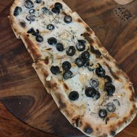 Vegan garlic bread with olives at The Pizza Bakery - Church St in Bangalore