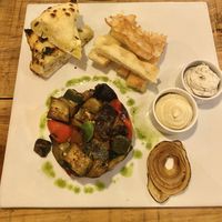 Caponata with vegan cheese and hummus, and garlic focaccia   at Arte Bianca - Cucina Italiana in Sagres