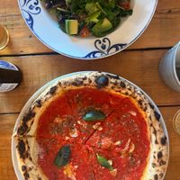 Green salad and pizza marinara  at Arte Bianca - Cucina Italiana in Sagres