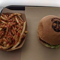 Oxpeck fries and Chick n' Crispy sandwich at Rhino Vegan Beat in Mykonos