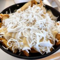 Cheesy fries at Rhino Vegan Beat in Mykonos