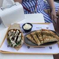  Truffle trouble, pita bread with olive oil and oregano, and a small side of tzatziki   at Rhino Vegan Beat in Mykonos