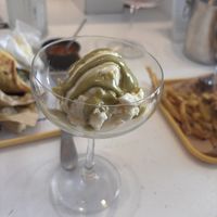 Vanilla ice cream with pistachio topping   at Rhino Vegan Beat in Mykonos