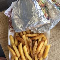 Pulled jackfruit and salad wrap with chips  at Earthling in Bournemouth