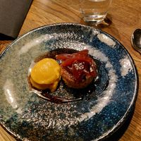 9: Almond cake with poached pear and berry ice cream at Funken Lodge in Longyearbyen