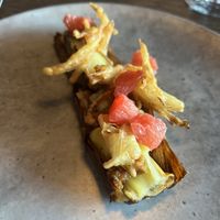 Grilled leak with truffle mayo, grapefruit and fried shallots on top.  at Funken Lodge in Longyearbyen