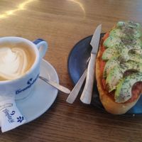 Tomato avocado toast and soy milk cafe con leche at Mambara in Santiago De Compostela