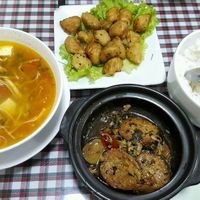 veg fish stew with lemongrass, oriental canna and chili (vegfish homemade from seaweed and soybean sheets), salted veg chicken stirfired (what actually was floured king oyster mushrooms fries with black seasames and lemon leaves) and sour mushroom soup. at Ho Tay in Hanoi