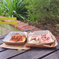 Margarita Foccacia and a maple and bacon doughnut at Belén Vegan Bakery in Wellington