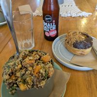 Quinoa salad and Biscoff doughnut. at Belén Vegan Bakery in Wellington