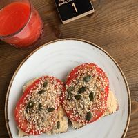 toast with hummus, tomatoes and mixed seeds   at Sedici in Ravenna