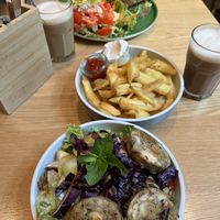 knödel bowl in the front, croissant breakfast in the back, two different chais  at Katzentempel - Leipzig Mitte in Leipzig