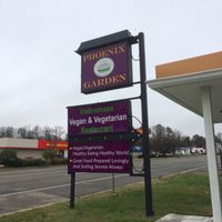 the sign outside, on a foggy day  at Phoenix Garden in Richmond