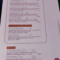 Front of the menu with the burgers & wraps  at The Saucy Cow in Dublin
