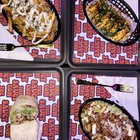 Garlic parm fries (top left), salt & chili tofu (top right), spicy chicken wrap (bottom left), and Caesar salad (bottom right)  #Veganuary at The Saucy Cow in Dublin