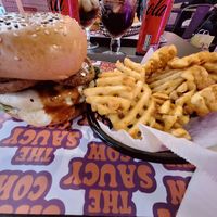 The Buckfast Barbecue burger and waffle fries. at The Saucy Cow in Dublin