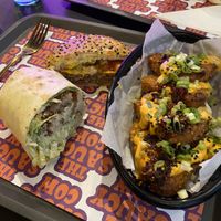 Caesar wrap, double cheeseburger, salt and chilli hash browns   at The Saucy Cow in Dublin