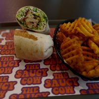 Caesar wrap and waffle fries at The Saucy Cow in Dublin
