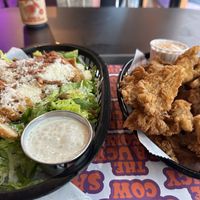 Caesar salad and fried mushrooms  at The Saucy Cow in Dublin