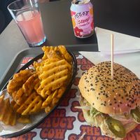 The space cowboy with the waffle fries and a soda  at The Saucy Cow in Dublin