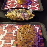 The classic (below) and dzouble cheese (above). Garlic parma fries. All vegan   at The Saucy Cow in Dublin