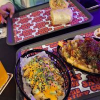 Spicy tofu, festive loads fries and the burnt peach martini at The Saucy Cow in Dublin